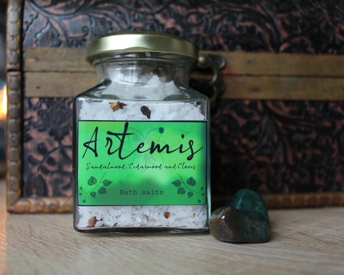 A jar of Artemis, sandalwood, cedarwood and cloves bath salts.