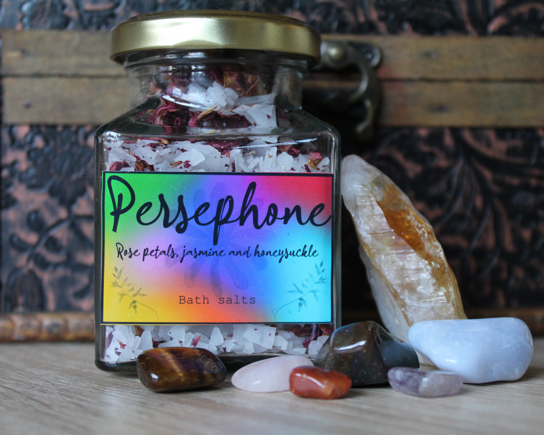 A jar of Persephone, rose petals, jasmine and honeysuckle bath salts.