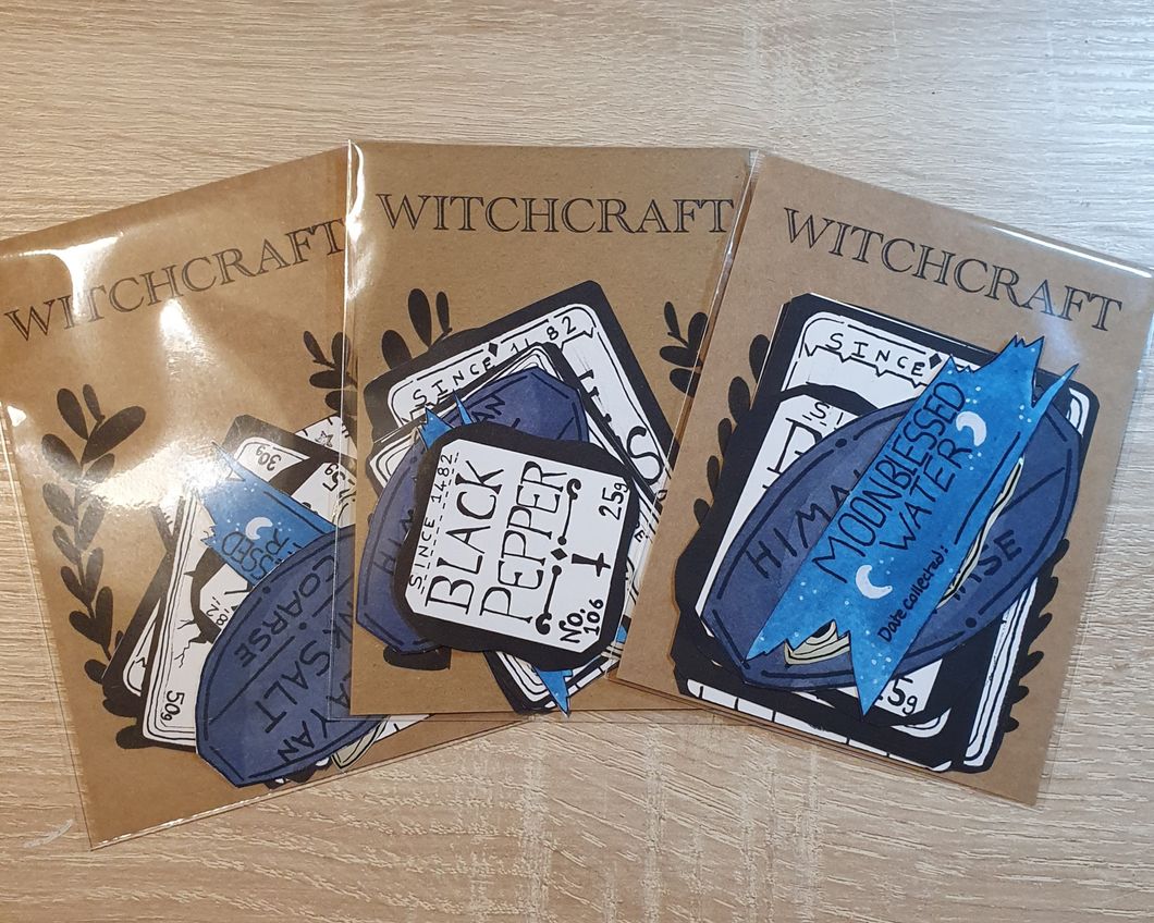 Multiple packs of witchcraft stickers such as Moonblessed water sign and black pepper sign.